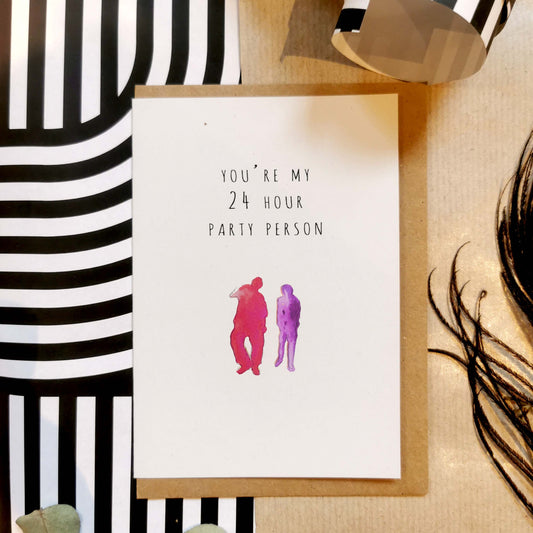 Greeting card with the phrase 'You're My 24 Hour Party Person,' featuring a minimalist design with pink and purple watercolor silhouettes of two figures. Ideal for fun-loving celebrations and unique gift ideas.